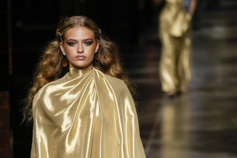 A model wears a creation for the Fendi Spring Summer 2022 collection during Milan Fashion Week, in Milan, Italy, Wednesday, Sept. 22, 2021. (AP Photo/Antonio Calanni)