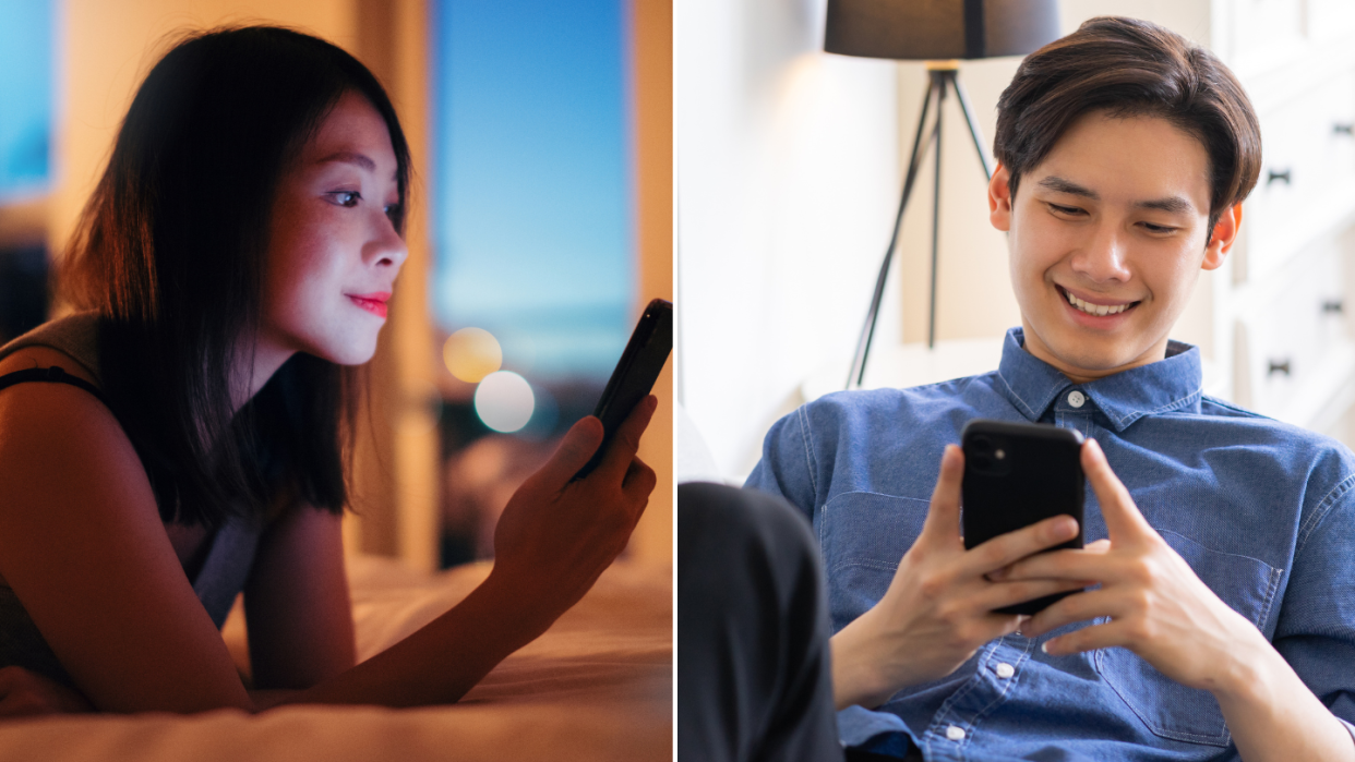 A woman lying on bed and a man sitting on a sofa check their online dating messages on their smartphone. (Photo: Getty Images)