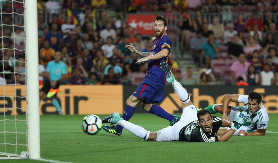 Lionel Messi (center) returned to a familiar role with Barcelona, and it worked. For now. (Reuters)