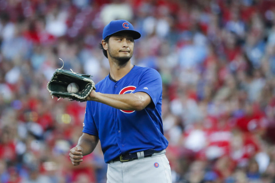Chicago Cubs starting pitcher Yu Darvish reacts after giving up a two-run home run to Cincinnati Reds' Aristides Aquino in the second inning of a baseball game, Friday, Aug. 9, 2019, in Cincinnati. (AP Photo/John Minchillo)