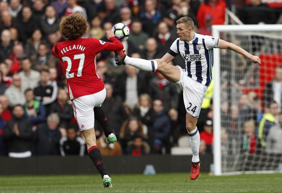 <p>Manchester United’s Marouane Fellaini, left, and West Bromwich Albion’s Darren Fletcher during the English Premier League soccer match at Old Trafford in Manchester, England </p>