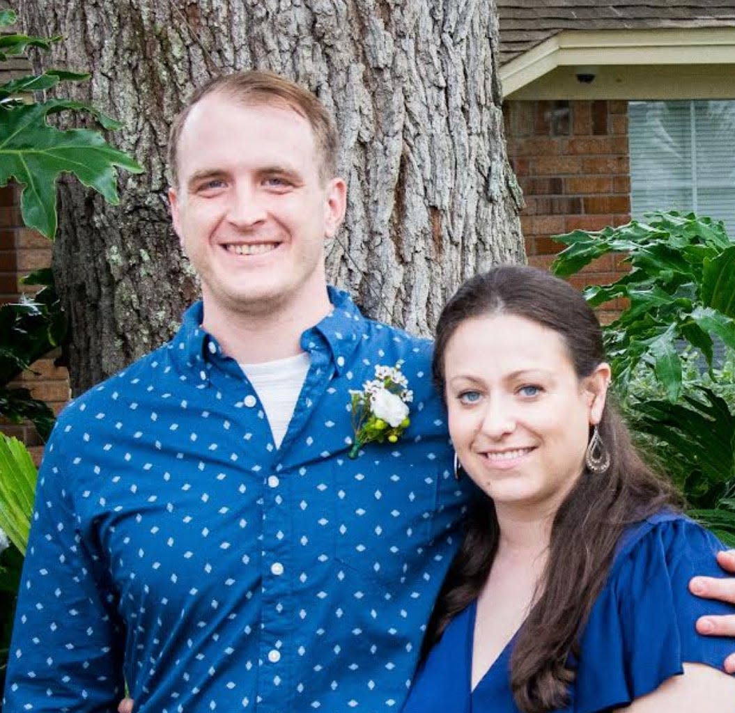Melanie Smith, of Norfolk, pictured with her husband, Drew Greene, is concerned about the broader implications of the Alabama decision on access to in vitro fertilization procedures.