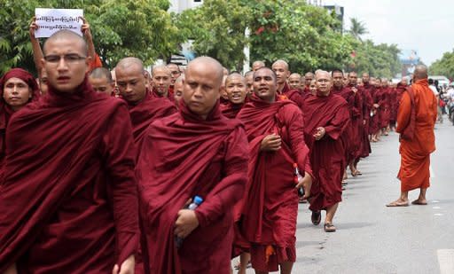 Myanmar Buddhist monks rally on the streets of Mandalay. Hundreds of Buddhist monks marched in Myanmar Sunday to support President Thein Sein's suggestion that Muslim Rohingya be deported or held in camps, in the biggest rally since the end of junta rule