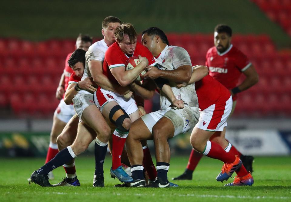 Nick Tompkins (centre) in action for Wales against EnglandGetty Images