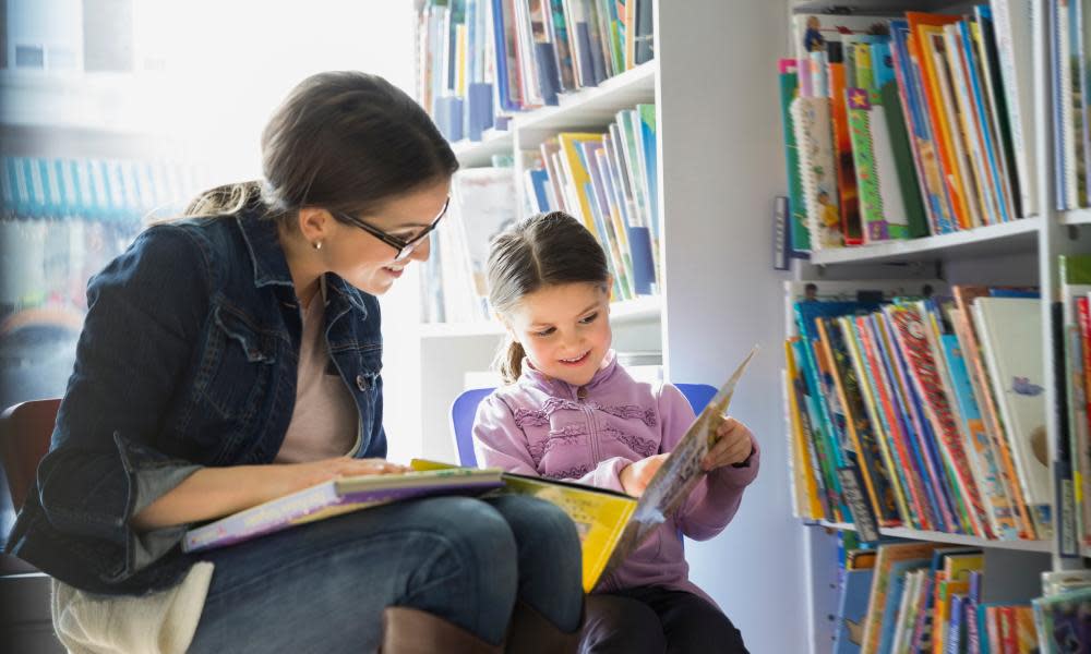 woman and child in library