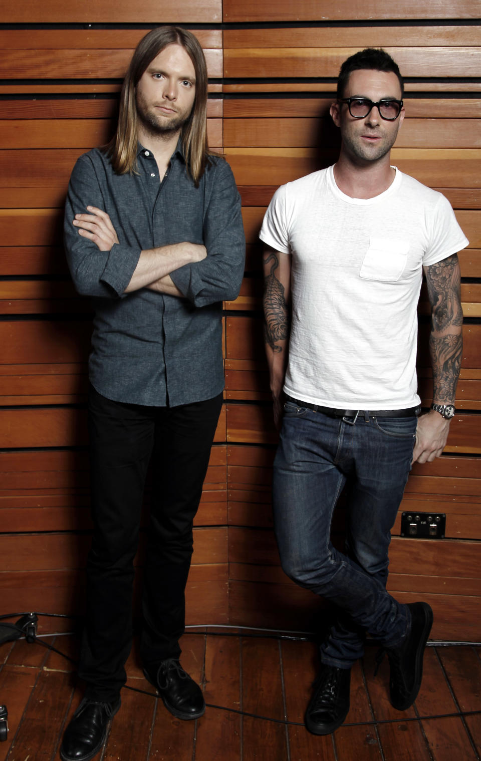 This May 22, 2012 photo shows Adam Levine, right, and James Valentine of the band Maroon 5, posing for a portrait in Los Angeles. The latest release by Maroon 5, "Overexposed," was released on Tuesday, June 26. (Photo by Matt Sayles/Invision/AP)