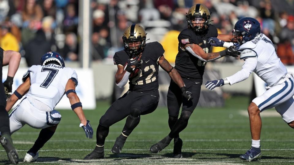 Nov 19, 2022; West Point, New York, USA; Army Black Knights running back Miles Stewart (22) carries the ball against the Connecticut Huskies during the first half at Michie Stadium.