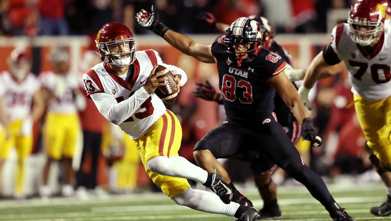 USC quarterback Caleb Williams tries to escape Utah defensive end Jonah Elliss as Utah and USC play at Rice-Eccles Stadium in Salt Lake City on Saturday, Oct. 15, 2022. Jonah’s dad Luther is on Kyle Whittingham’s staff and was an All-American for the Utes as a player.