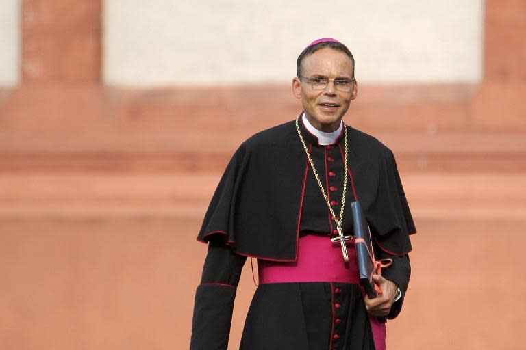 Bishop of Limburg Franz-Peter Tebartz-van Elst walking out of the cathedral in Limburg an der Lahn, central Germany, on August 30, 2013