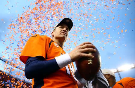 Jan 24, 2016; Denver, CO, USA; Denver Broncos quarterback Peyton Manning (18) celebrates after defeating the New England Patriots in the AFC Championship football game at Sports Authority Field at Mile High. Mark J. Rebilas-USA TODAY Sports