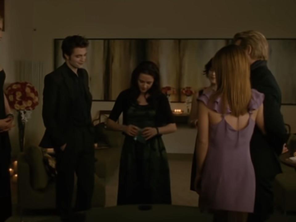 bella at the cullens for her birthday party in twilight new moon