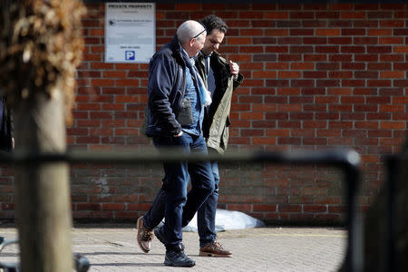 Inspectors from the Organisation for the Prohibition of Chemical Weapons (OPCW) arrive to begin work at the scene of the nerve agent attack on former Russian agent Sergei Skripal, in Salisbury, Britain March 21, 2018. REUTERS/Peter Nicholls