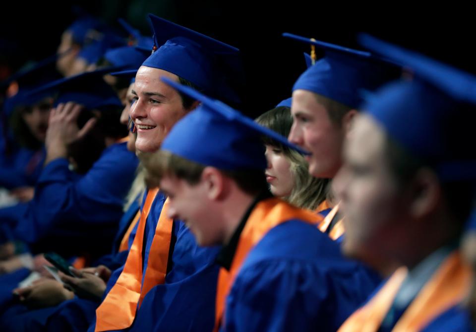 Students take their seats during Appleton West High School's graduation ceremony in 2022.