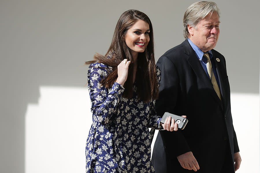 Hicks walking with Steve Bannon. (Photo: Getty Images)