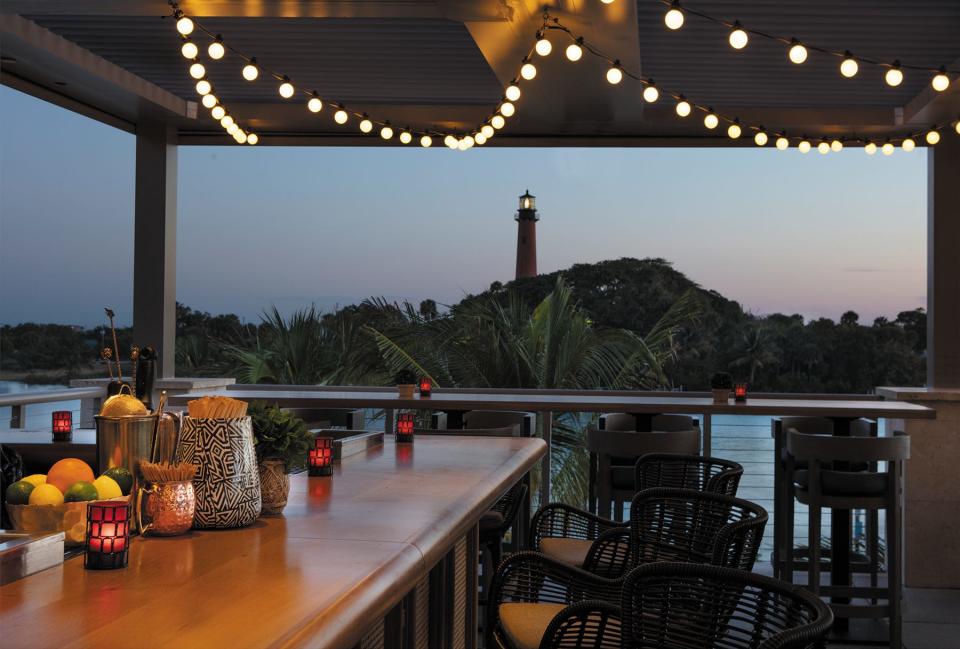 Creative drinks and bites await at Topside rooftop bar on Jupiter's Love Street.