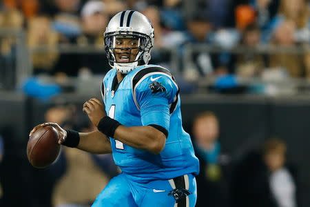 Nov 17, 2016; Charlotte, NC, USA; Carolina Panthers quarterback Cam Newton (1) runs the ball in the third quarter against the New Orleans Saints at Bank of America Stadium. The Panthers defeated the Saints 23-20. Mandatory Credit: Jeremy Brevard-USA TODAY Sports