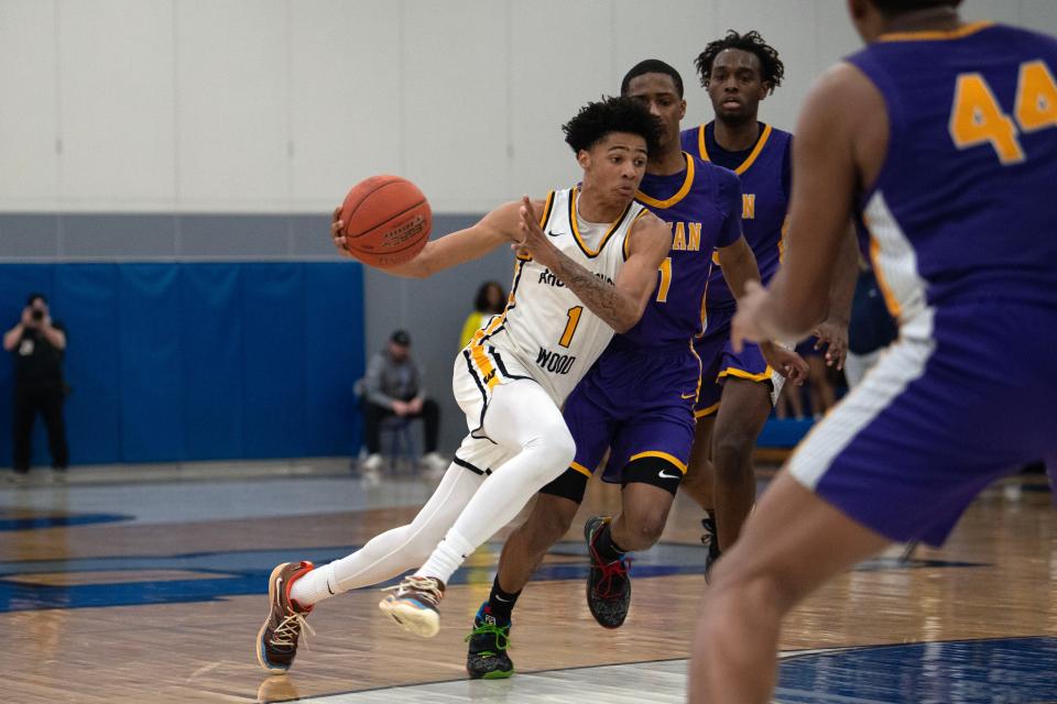 Archbishop Wood junior Jalil Bethea drives past Roman Catholic's Xzayvier Brown during the PIAA Class 6A semifinal game against Roman Catholic at Bensalem High School on Tuesday, March 21, 2023. The Vikings fell, 66-56.