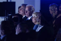 President Joe Biden and first lady Jill Biden watch as Elton John performs on the South Lawn of the White House in Washington, Friday, Sept. 23, 2022. John is calling the show "A Night When Hope and History Rhyme," a reference to a poem by Irishman Seamus Heaney that President Joe Biden often quotes. (AP Photo/Susan Walsh)