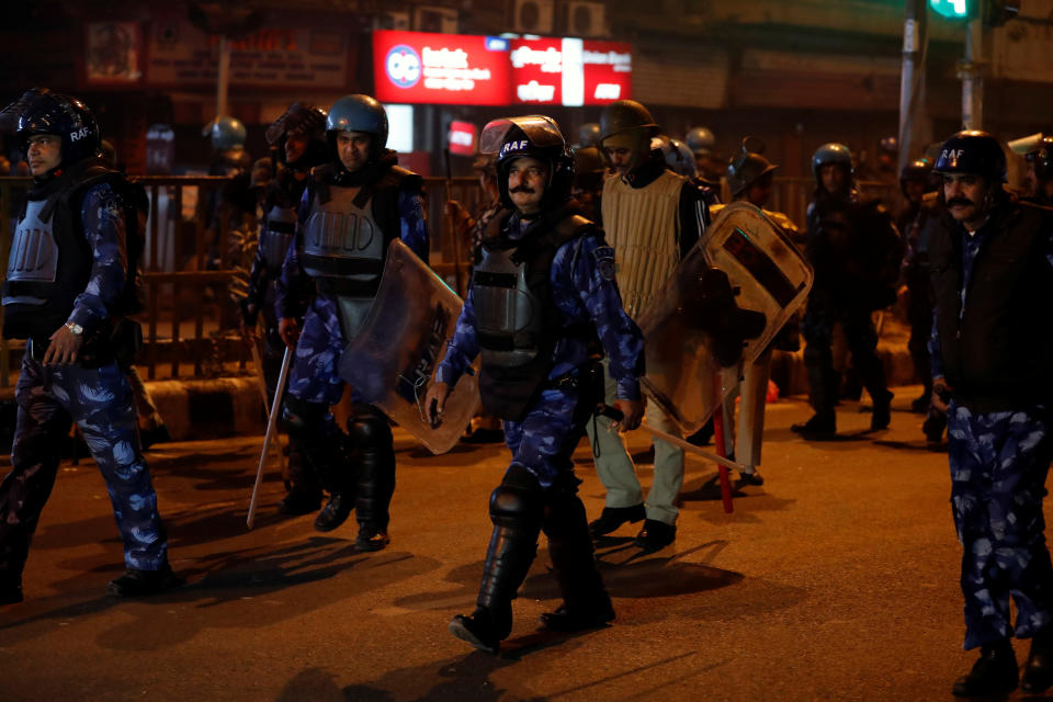 Riot police officers patrol after a protest against a new citizenship law in Delhi, India, December 20, 2019. REUTERS/Adnan Abidi