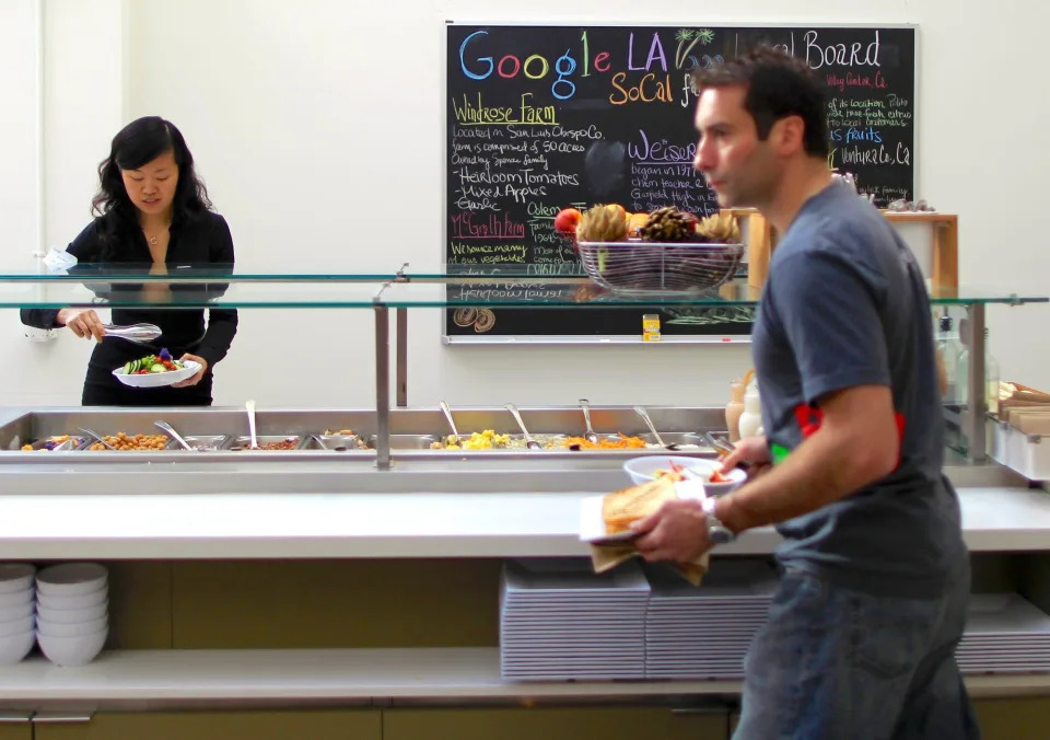 Google workers in an office cafeteria.