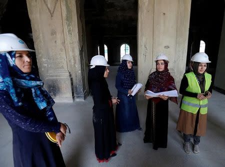 Afghan female engineers work inside the ruined Darul Aman palace in Kabul, Afghanistan October 2, 2016. REUTERS/Mohammad Ismail