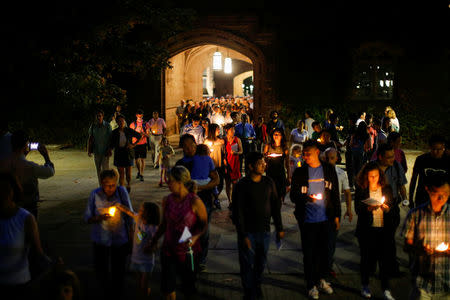 People attend a vigil for Xiyue Wang at Princeton University in Princeton, New Jersey, U.S. September 15, 2017. REUTERS/Eduardo Munoz