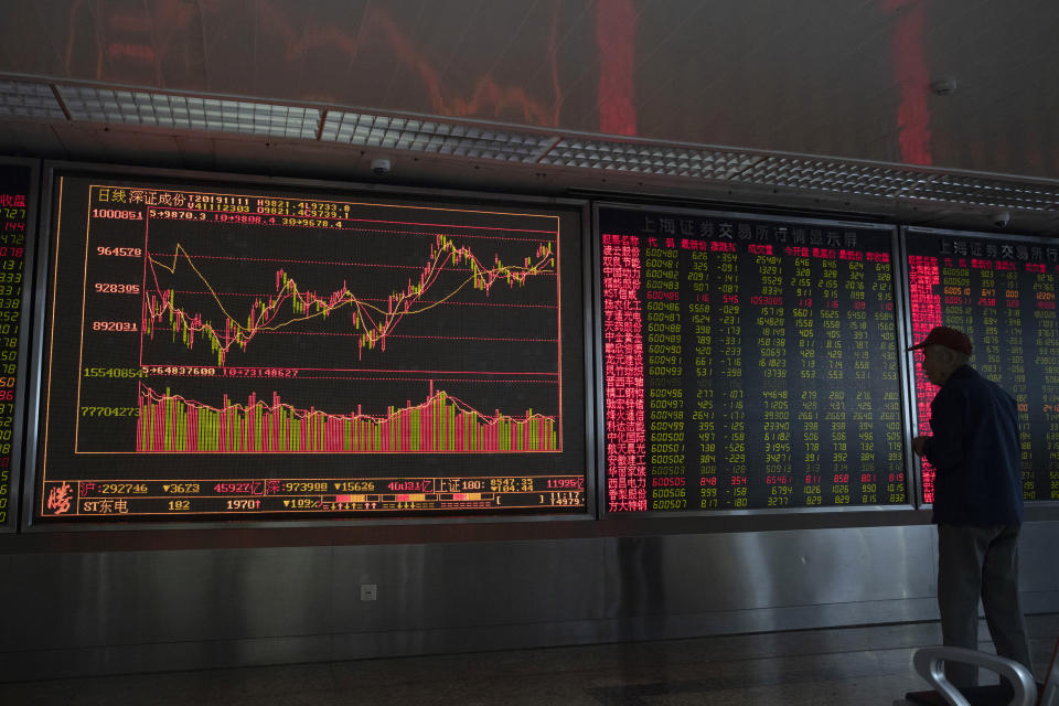An investor monitors stock prices at a brokerage in Beijing Monday, Nov. 11, 2019. Shares declined Monday in Asia as investors watched for the latest developments in the China-U.S. trade war sage. (AP Photo/Ng Han Guan)