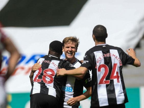 Matt Ritchie celebrates scoring Newcastle’s second goal in the victory over Sheffield United (AP)