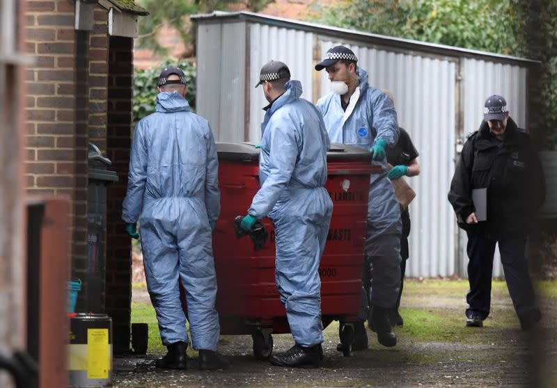 Police forensic officers are seen at a residential address in Streatham, south London