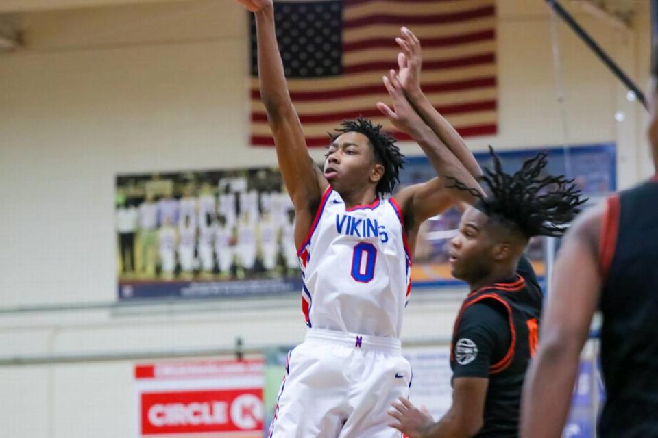 North Meck player Isaiah Evans drops two on Chambers
