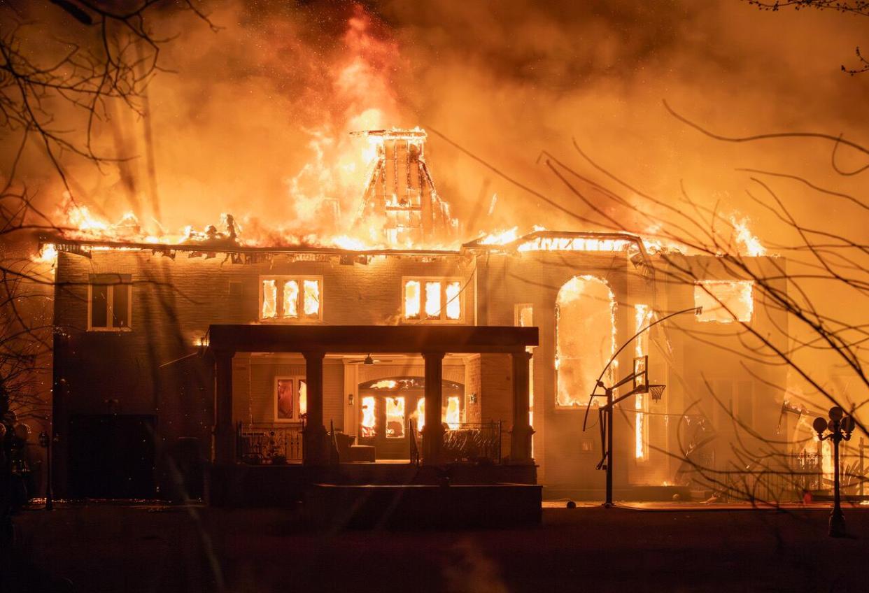 A fire gutted three homes in Richmond Hill on March 10, 2024. (CBC - image credit)