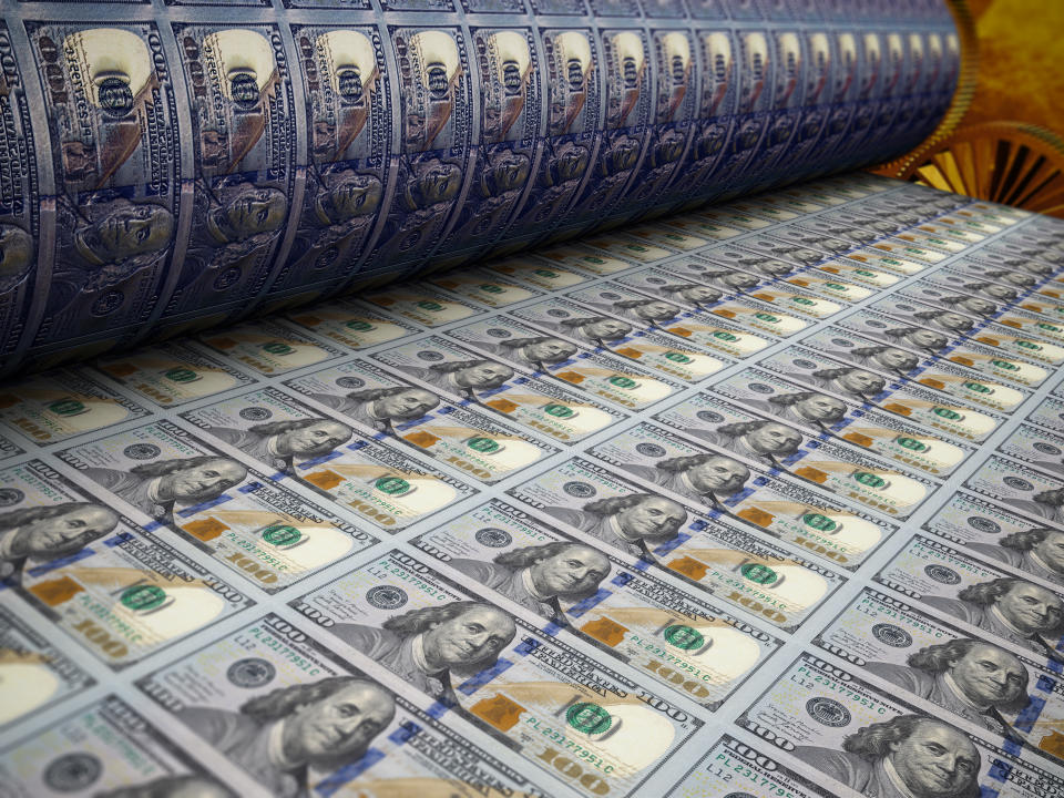 Printing press of dollars（示意圖／Getty Images）