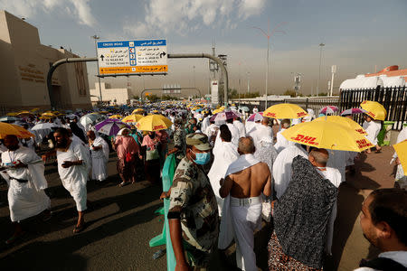 Muslim pilgrims gather on Mount Mercy on the plains of Arafat during the annual haj pilgrimage, outside the holy city of Mecca, Saudi Arabia August 20, 2018. REUTERS/Zohra Bensemra