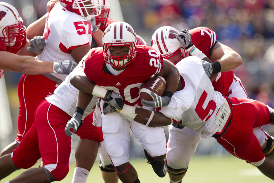 Sep 25, 2010; Madison, WI, USA; Wisconsin Badgers running back James White (20) rushes with the football during the first quarter against the Austin Peay Governors at Camp Randall Stadium. Mandatory Credit: Jeff Hanisch-USA TODAY Sports