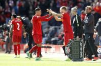 Britain Soccer Football - Liverpool v Everton - Premier League - Anfield - 1/4/17 Liverpool's Ragnar Klavan comes on as a substitute to replace Roberto Firmino as Liverpool manager Juergen Klopp looks on Action Images via Reuters / Carl Recine Livepic