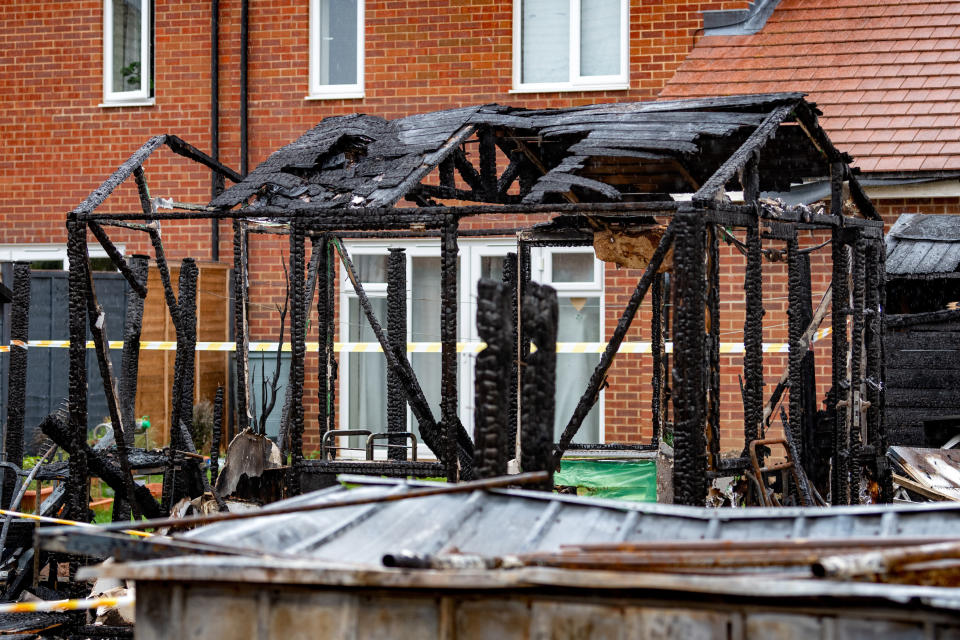 A freak fire left three families homeless after a shard of glass reflected onto a wooden fence (SWNS)