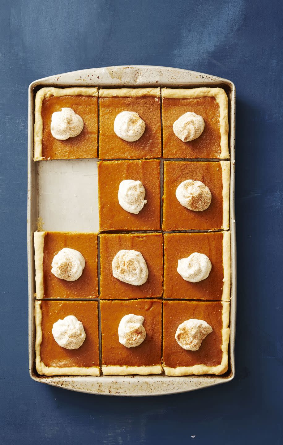 <p>Who says pies have to be round? Whether you're a corner crust lover or the middle piece is your game, this sheet pan pumpkin pie has something for everyone. </p><p><em><a href="https://www.goodhousekeeping.com/food-recipes/a41084/pumpkin-slab-pie-recipe/" rel="nofollow noopener" target="_blank" data-ylk="slk:Get the recipe for Pumpkin Slab Pie »;elm:context_link;itc:0;sec:content-canvas" class="link ">Get the recipe for Pumpkin Slab Pie »</a></em><br></p>