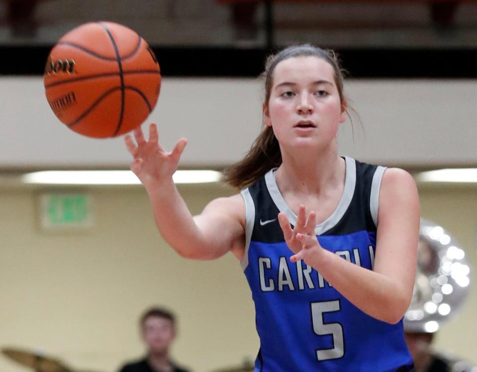 Carroll Cougars guard Madison Wagner (5) passes the ball during the IHSAA girl’s basketball game against the Lafayette Jeff Bronchos, Thursday, Jan. 26, 2023, at Lafayette Jeff High School in Lafayette, Ind. 