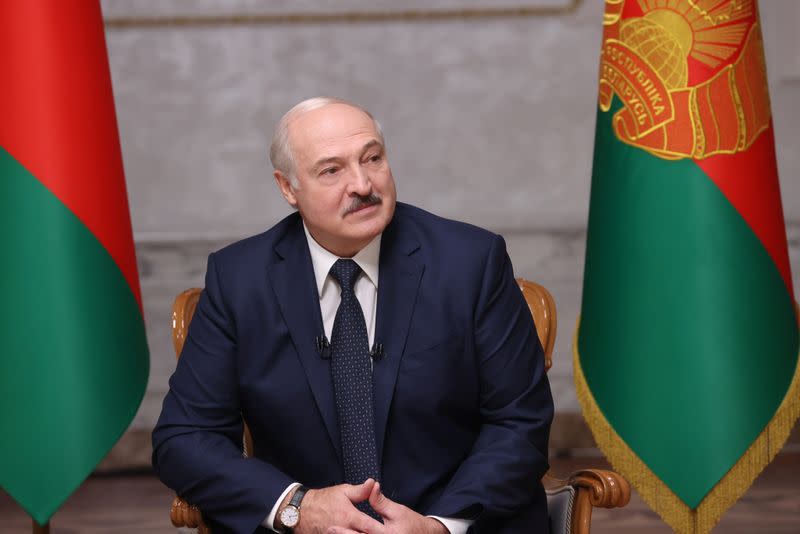 Belarusian President Alexander Lukashenko attends an interview with journalists of Russian media in Minsk