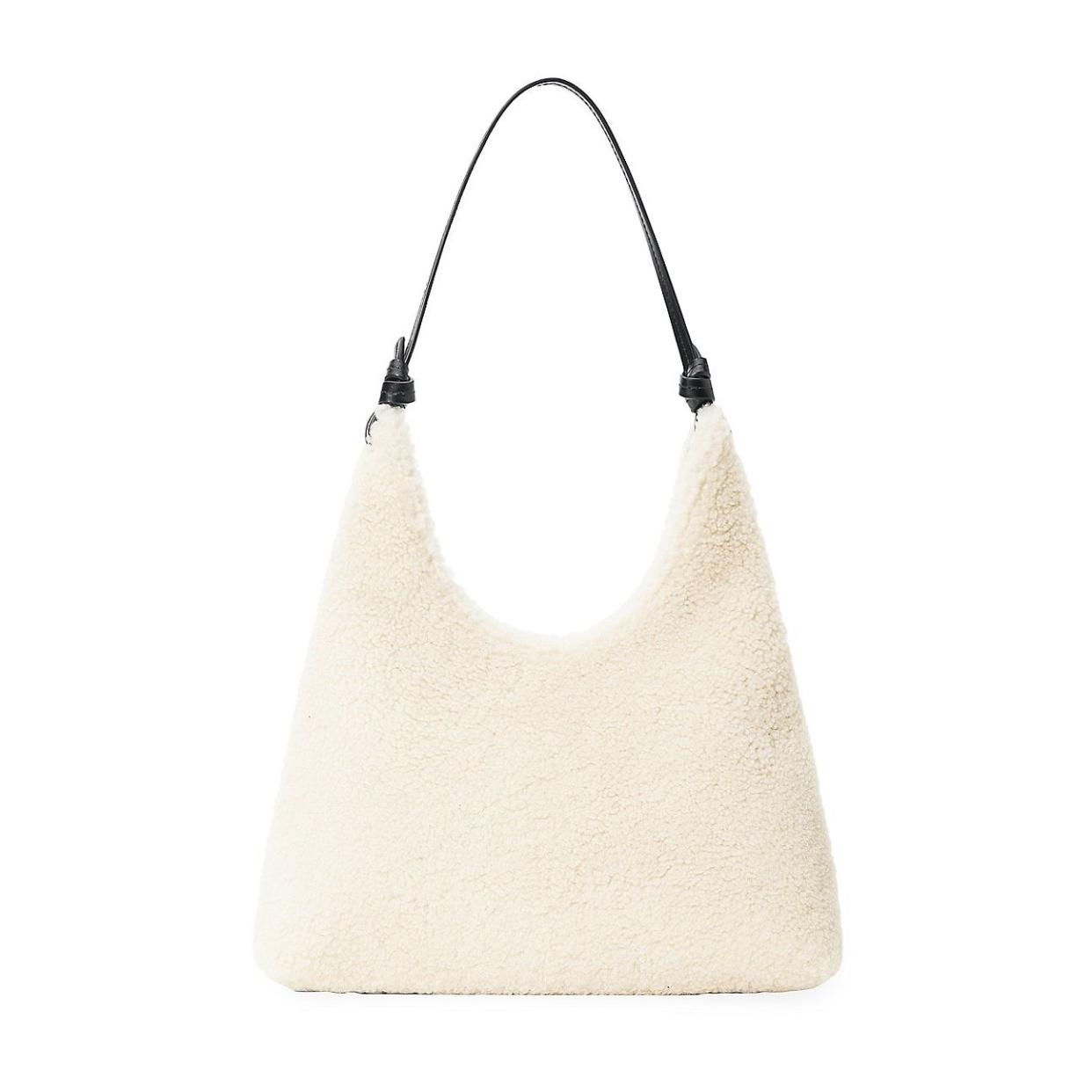 <p><a href="https://go.redirectingat.com?id=74968X1596630&url=https%3A%2F%2Fwww.saksfifthavenue.com%2Fproduct%2Fstaud-winona-shearling-shoulder-bag-0400020174532.html&sref=https%3A%2F%2Fwww.townandcountrymag.com%2Fstyle%2Ffashion-trends%2Fg61948095%2Fbest-labor-day-sales-editors-picks-2024%2F" rel="nofollow noopener" target="_blank" data-ylk="slk:Shop Now;elm:context_link;itc:0;sec:content-canvas" class="link rapid-noclick-resp">Shop Now</a></p><p>Winona Shearling Shoulder Bag</p><p>saksfifthavenue.com</p><p>$197.50</p>