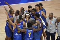 Cape Verde team members celebrate after defeating Venezuela in their Basketball World Cup group F match in Okinawa, southern Japan, Monday, Aug. 28, 2023. (AP Photo/Hiro Komae)