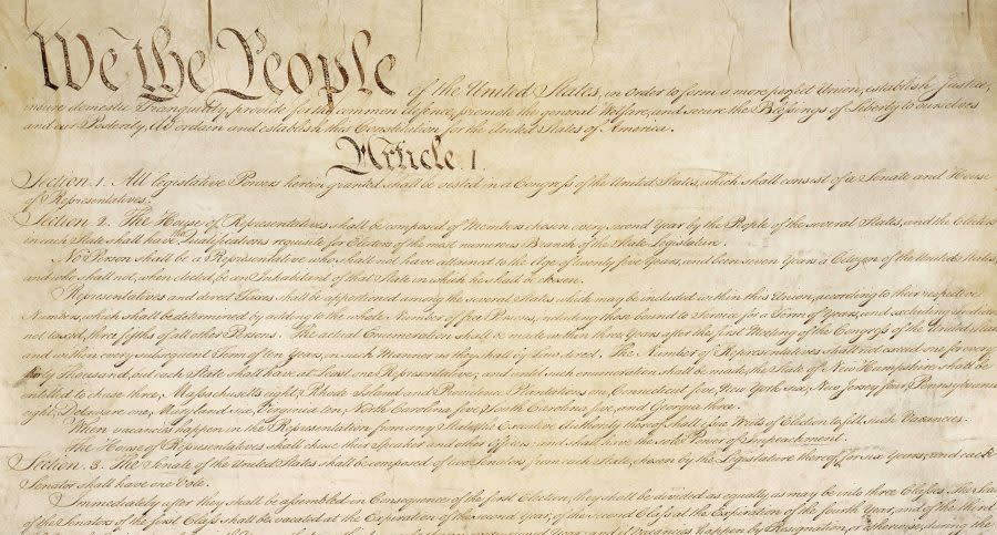 <em>This photo made available by the U.S. National Archives shows a portion of the first page of the United States Constitution. (National Archives via AP)</em>