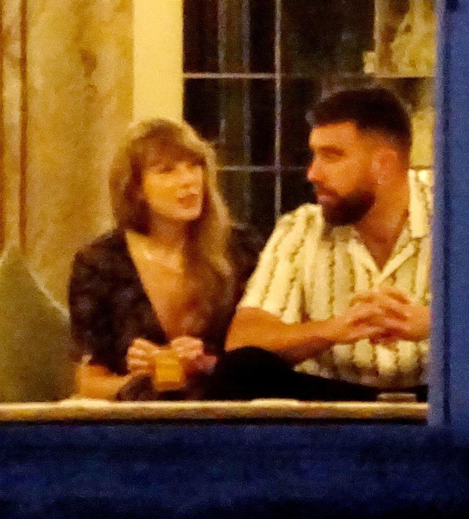 taylor swift and travis kelce on their lake como villa balcony