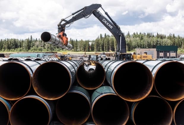 The estimated construction cost for the Trans Mountain pipeline expansion has ballooned from $5.4 billion to $12.6 billion. (Jason Franson//The Canadian Press - image credit)