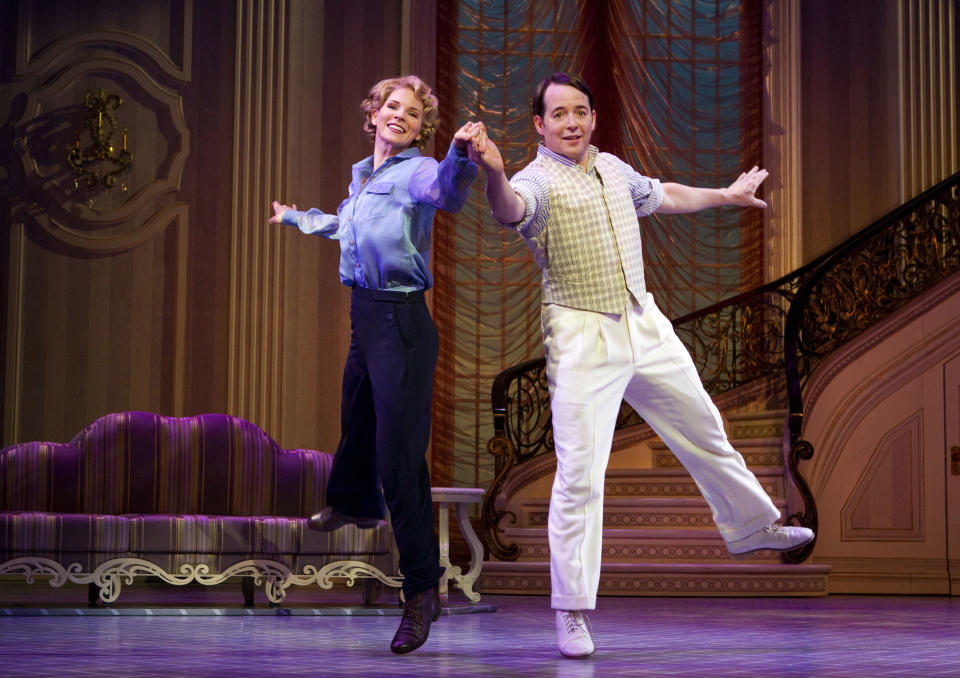 In this publicity photo provided by Boneau/Bryan-Brown, Kelli O'Hara, left, and Matthew Broderick perform in the new musical comedy "Nice Work If You Can Get It" at Broadway's Imperial Theatre in New York. (AP Photo/Boneau/Bryan-Brown, Joan Marcus)