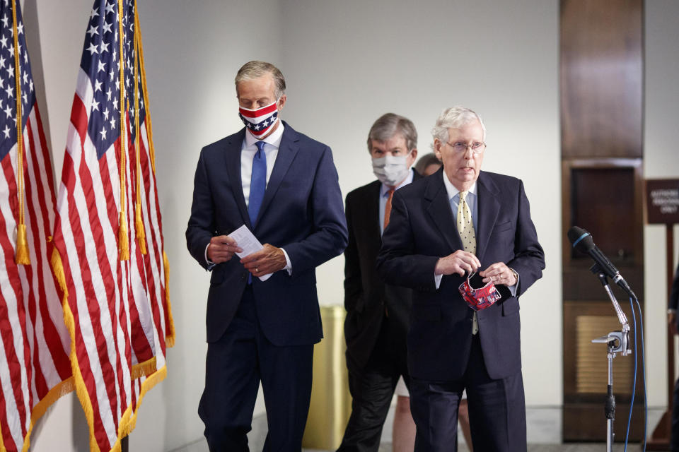 WASHINGTON, July 21, 2020  -- U.S. Senate Majority Leader Mitch McConnell R, Front attends a press conference on Capitol Hill in Washington, D.C., the United States, on July 21, 2020. McConnell said on Tuesday that the next COVID-19 relief bill will include a second round of stimulus checks to American households and Paycheck Protection Program loans for small businesses.  (Photo by Ting Shen/Xinhua via Getty) (Xinhua/ via Getty Images)