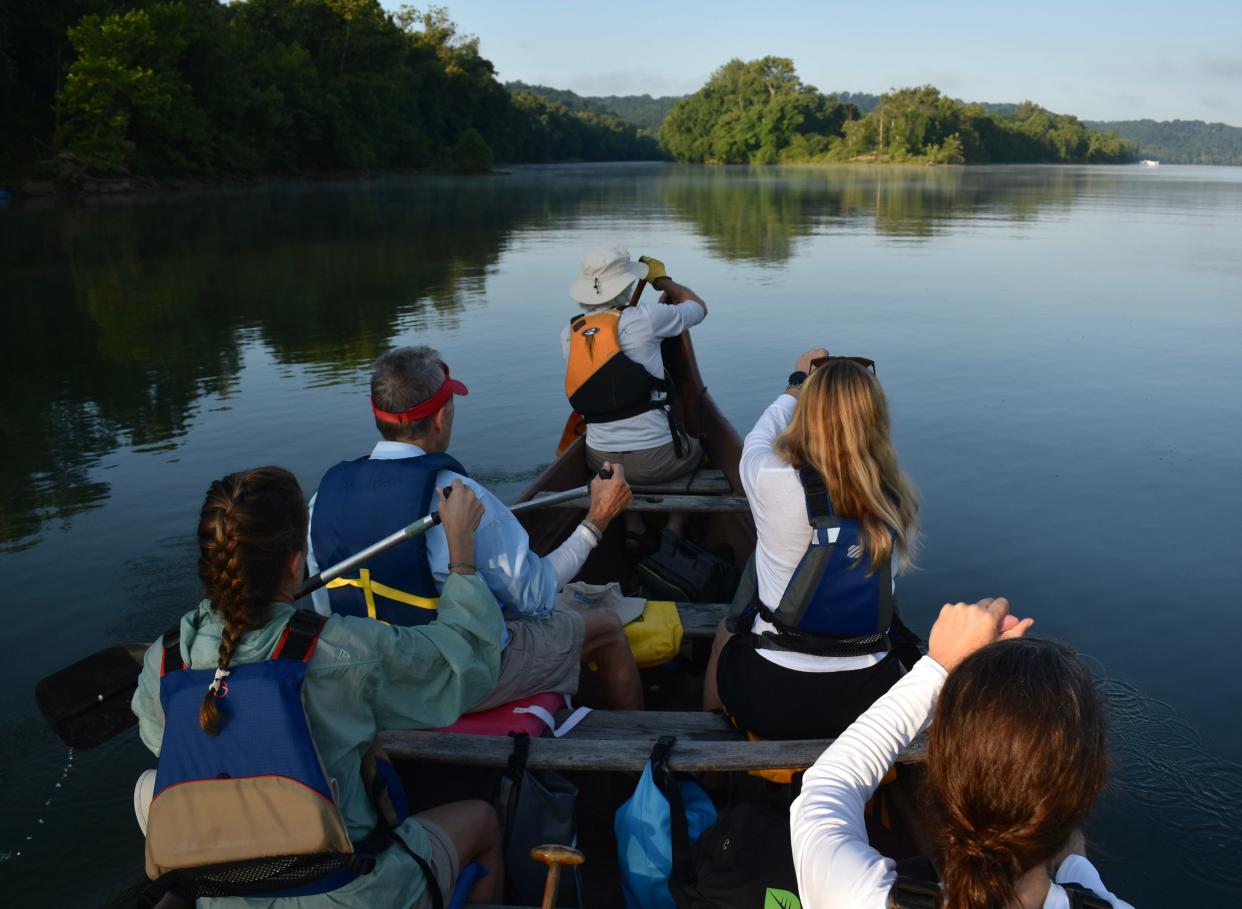 Paddlers head downstream on the Ohio River from Westport, Kentucky, toward Louisville, with John Nation at the bow. July 22, 2023