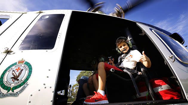 Domenic, who suffers from cystic fibrosis, was quickly whisked away in PolAir to a ‘top secret’ operations room in Parramatta’s state crime command for immediate briefing. Photo: NSW Police