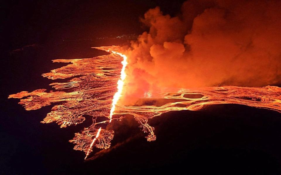 Lava flows as the volcano erupts near the Grindavik fishing town