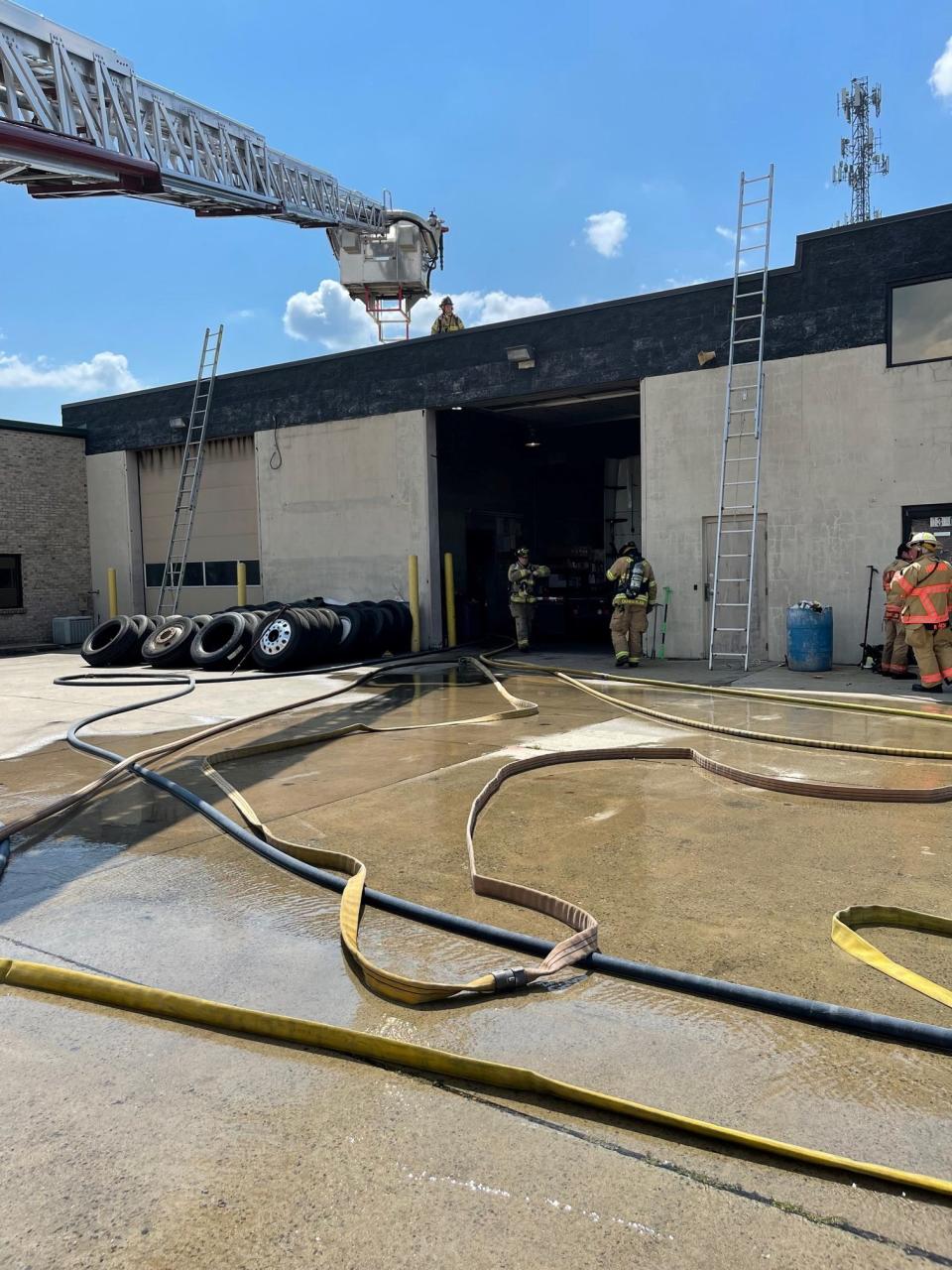 Alamance County firefighters putting out Graham business fire